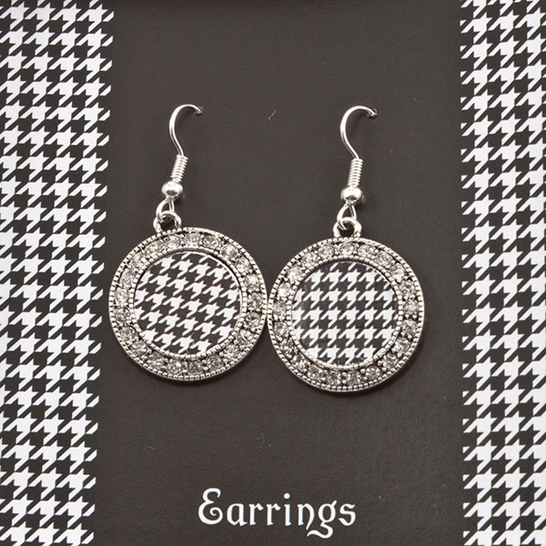 Wholesale silver toned Houndstooth earrings crystal rhinestones surrounding logo